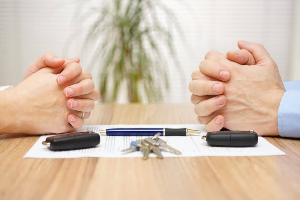 binding financial agreements - couple figuring out how to split shared assets like house keys and car keys - Melbourne law studio